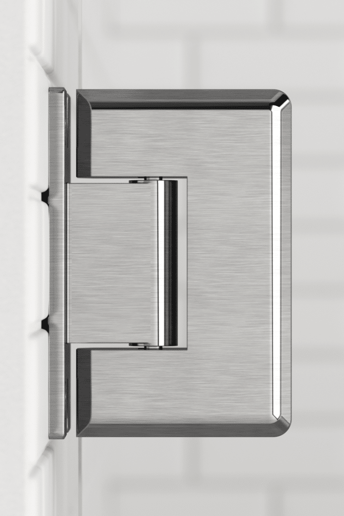 Stainless steel modern door handle on a white shower door.